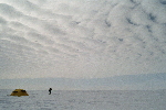 Photographer, tent, clouds