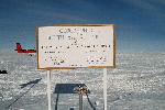 Little Penguin at the 2006 South Pole marker