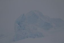 Twin Otter causing snow flurry in camp