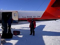 Posing with Twin Otter in Antarctica