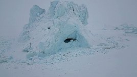 Iceberg with cave