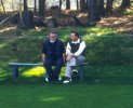 Kevin Costner resting during a round of golf