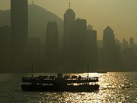 Hong Kong skyline with backlit ferry