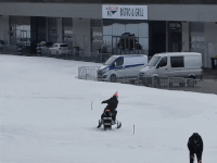Slow snowmobile slalom