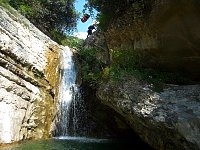 Abseil close to a waterfall near Tremosine