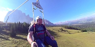 Monte Pana ziplining in paraglider seat
