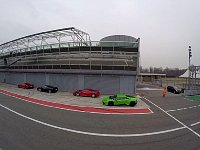 Lamborghinis and Ferraris in Monza pitlane