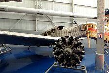 Open cockpit metal plane