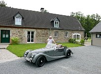 Morgan car, me and cottage