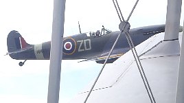 Spitfire close to Dragon Rapide