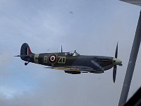 Spitfire close to Dragon Rapide