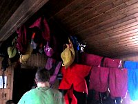 Dog coats drying in hut