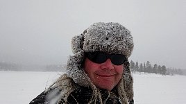 Me dogsledding in the snow