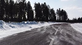 Swedish road in winter with snow drift