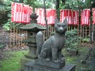 Guardian fox statue near Zojoji Temple
