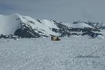 Snowmobile in Antarctica pulling 'people carrier'