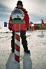 Me, standing at ceremonial South Pole