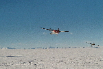Twin Otters taking off