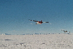 Twin Otters taking off