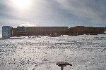 2005 Pole marker and new South Pole Station