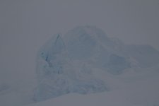 Twin Otter causing snow flurry in camp