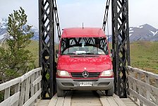 Bus on narrow bridge