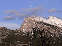 Moon over mountain near Banff