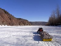 Snowmobile and skimmer on Yukon River