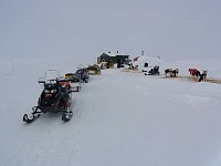 Shingle Point hut, snowmobiles and dogs