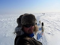 Me dogsledding on the Mackenzie River
