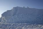 Inuit on iceberg, watching for walrus