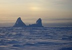 Iceberg frozen in ice