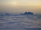 Iceberg frozen in ice