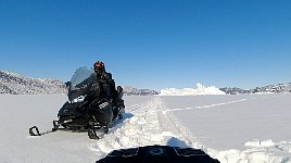 Snowmobile on Sikuijuitsoq Fjord