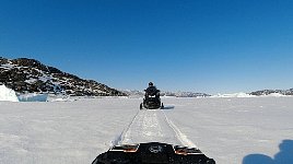Snowmobile on Sikuijuitsoq Fjord