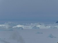 Icebergs spot lit by the sun