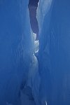 Iceberg with blue crack from inside