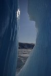 Iceberg with blue crack from inside