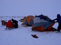 Dismantling the camp on a windy day