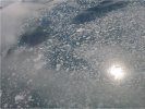 Sun reflection among icebergs