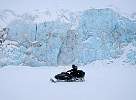 Snowscooter at Tempelfjord glacier