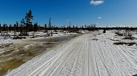 Snowmobiling near overflow in northern Sweden