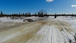 Snowmobiling near overflow in northern Sweden