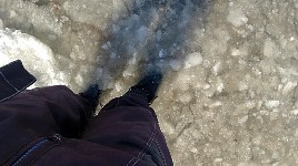 Wet ground at parking lot