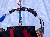 Sled bow decorated with dog booties