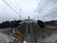 Holmenkollen ski jump from below with ziplines