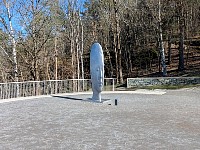 Distorted head sculpture by Jaume Plensa
