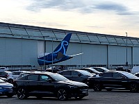 Plane tail sticking out of hangar