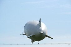 Zeppelin NT behind airport fence