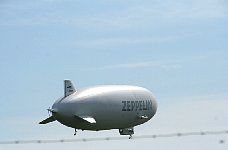 Zeppelin NT behind airport fence